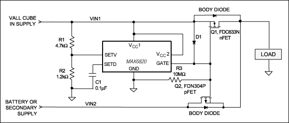 Figure 1. This power-supply sequencer senses a loss of the main supply voltage and, by controlling the two FETs, automatically switches the load to the secondary (backup) supply.