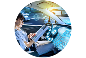 Person inside a car with In-cabin assited automotive technologies.