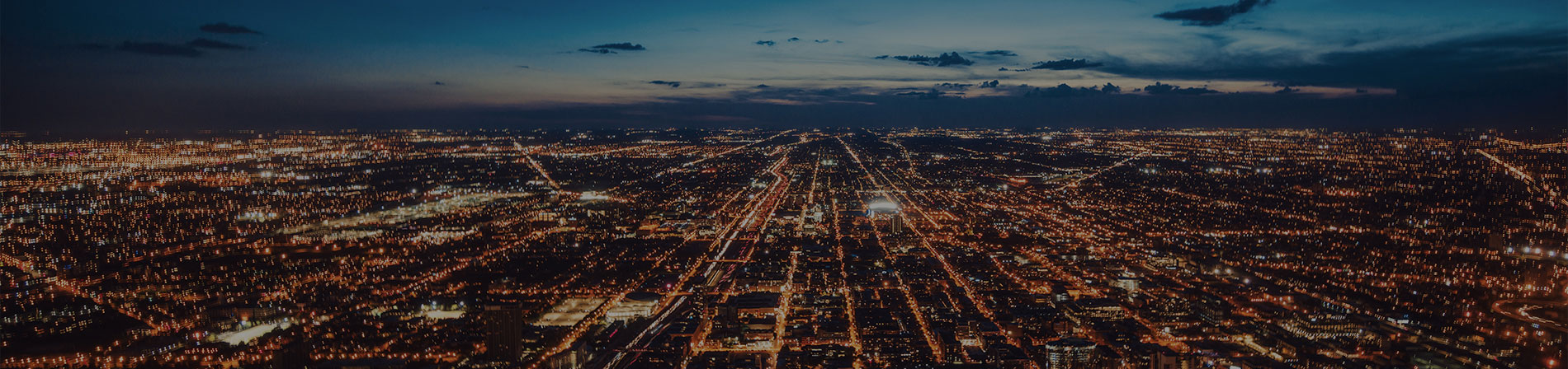 City grid lit up at dusk