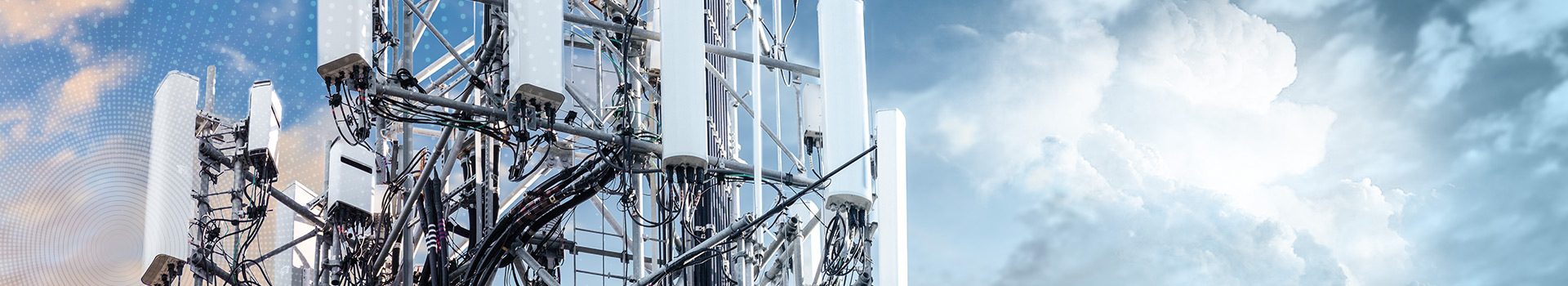 5G MIMO close-up with blue sky and clouds at the background