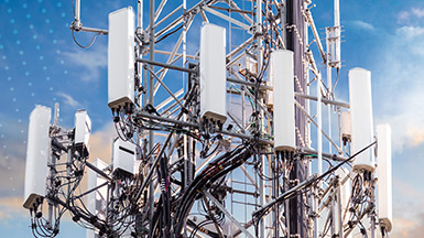 5G MIMO close-up with blue sky and clouds at the background