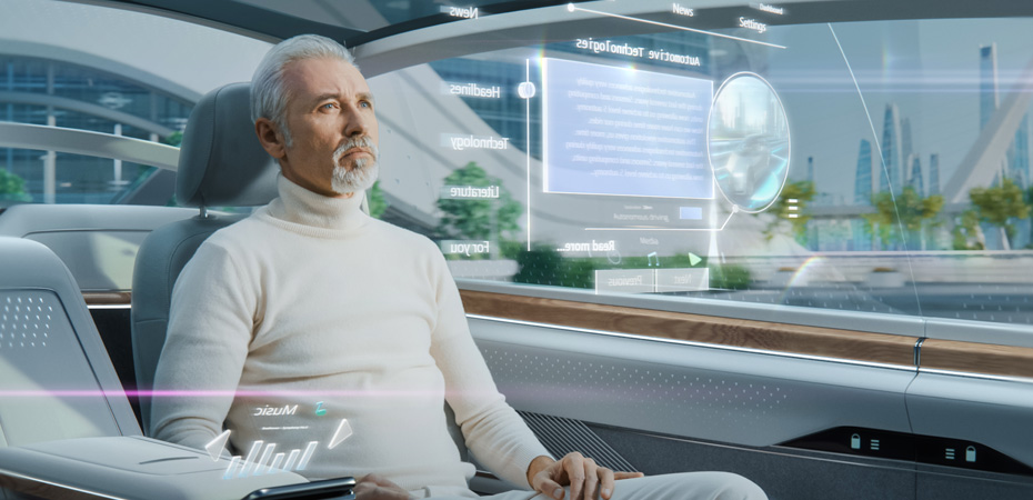 Man seated inside an autonomous driving vehicle while looking at an HUD screen overlay of data.