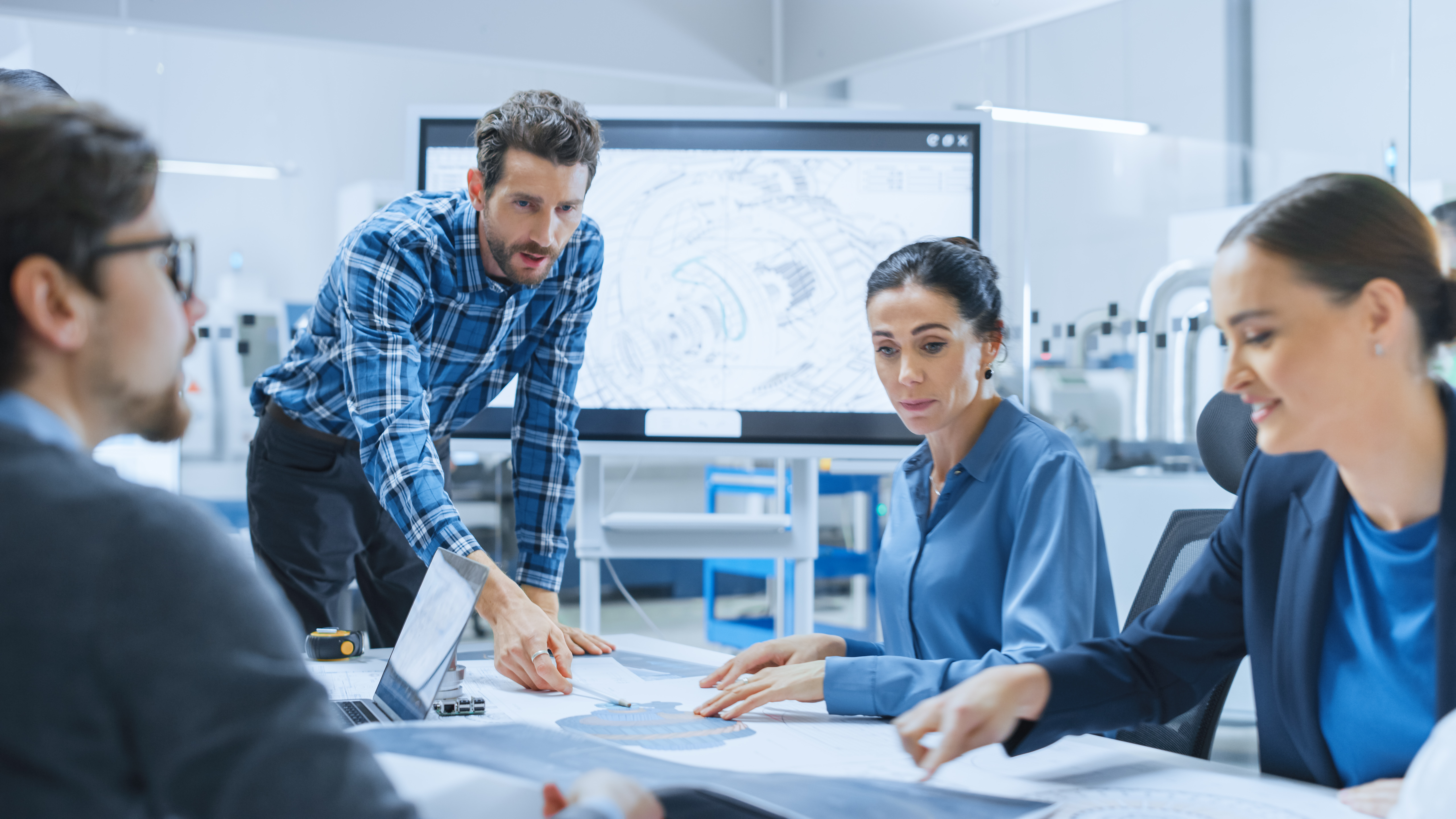 a diverse team group collaborating on new technologies