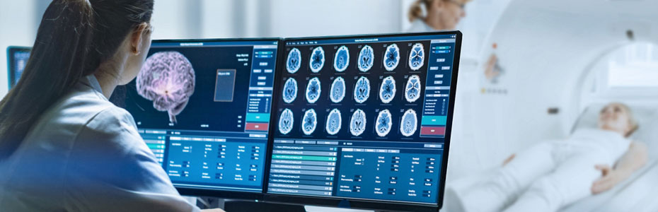 Technician reviews patient’s m.r.i. brain scan results