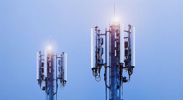 Communication towers with blue background.