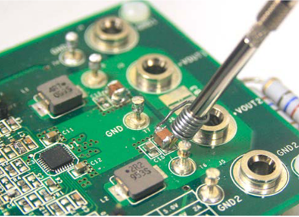 Figure 10. Tip and Barrel Method Probed on Output Capacitor   Using Coil Wire.