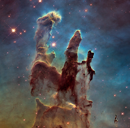 Image shows an outer space Nebula called The Eagle Nebula. Image was captured in the Visible Light spectrum.